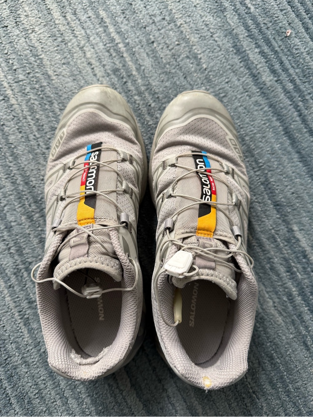 Salomon woman  Light Gray Athletic Shoes with Yellow Accent size 7.5 woman